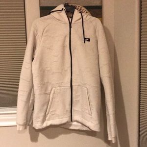 Thick white/black Nike zip up jacket.